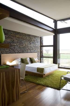 16-ultra-modern-bedroom-with-a-stone-wall-that-gives-texture-to-the-room